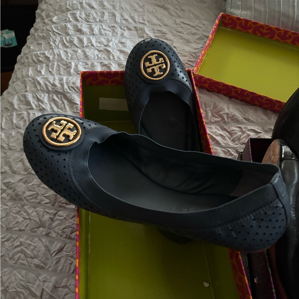 Tory Burch Perforated Black Flats with Gold Emblem